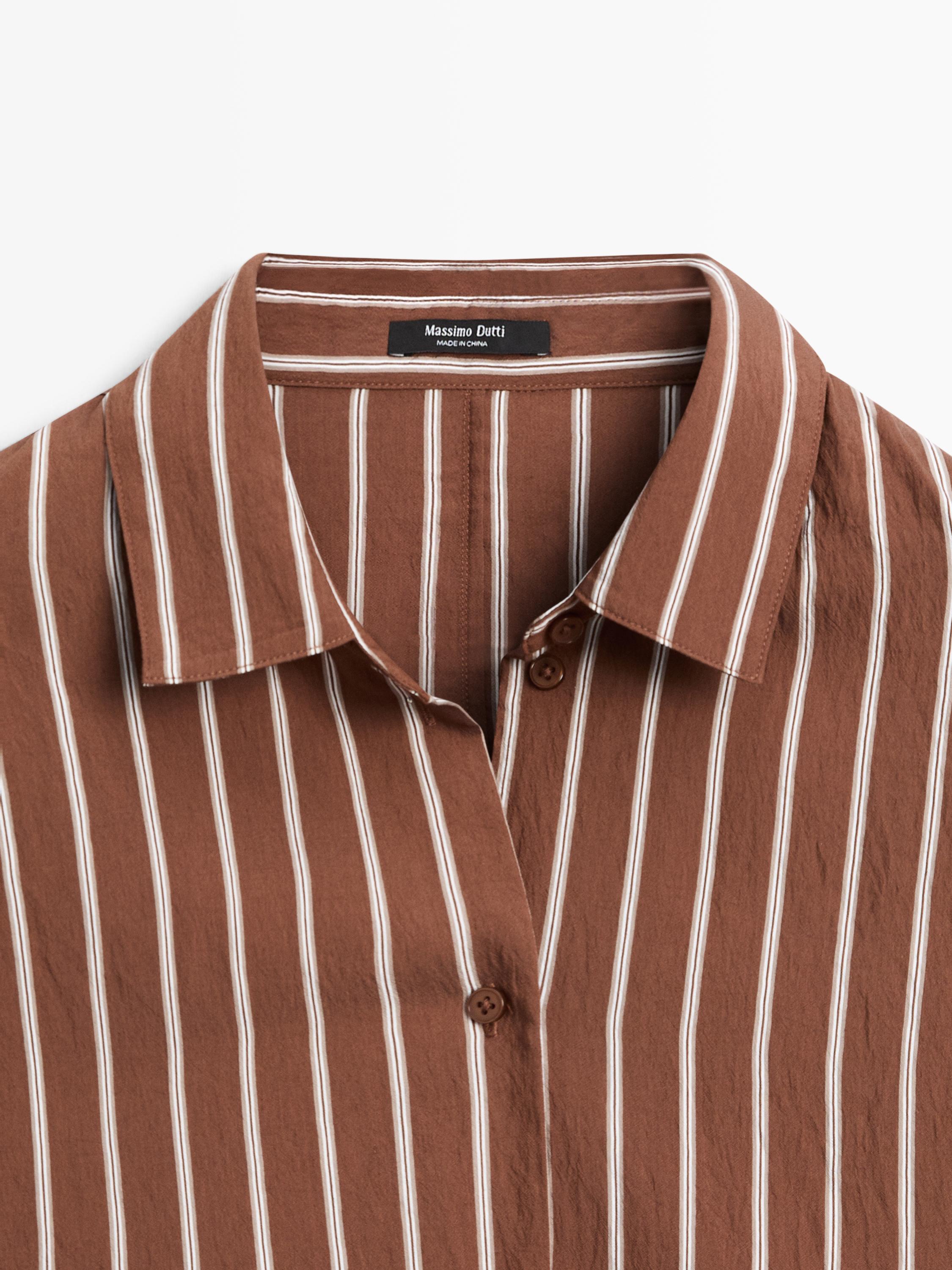 Flowing striped shirt with batwing sleeves